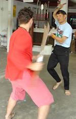 Kru Pedro Villaobos and the Ajarn Thai Sword Master practice sword