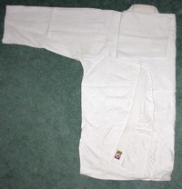 Folding the Gi: gi jacket folded one arm on top