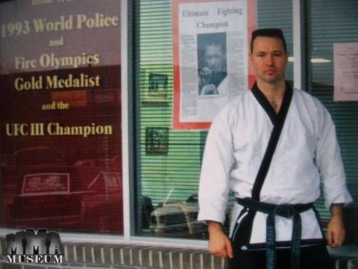 Keith Hackney in front of his martial arts school.