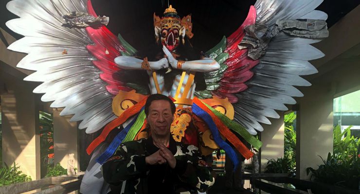 GM Samuel Kwok in front of the mascot for the 1st Bali International Kungfu Championships 