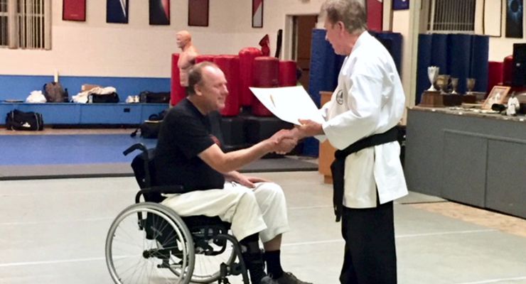 Martial Arts instructor Peters Grootenhuis receives his Sandan or 3rd degree Balck Belt.