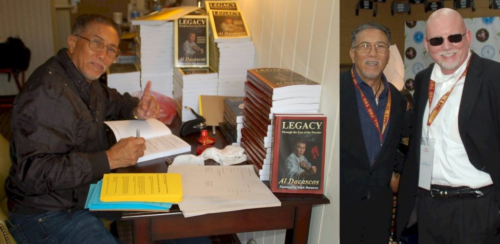 Al Dacasco signing copies of Legacy and Bohdi Sanders being honored at the All Pro TKD event.